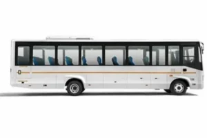 27-seater Bharat Benz corporate group coach exterior view showcasing modern design and spacious windows, ideal for corporate travel and group transportation.
