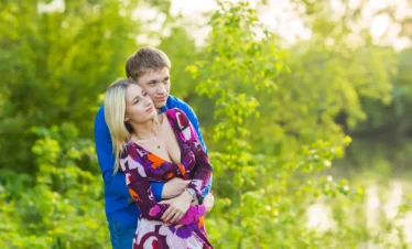 Romantic couple enjoying a peaceful Kerala honeymoon surrounded by lush greenery and natural beauty