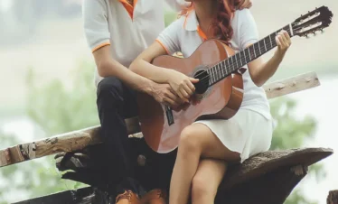 Kerala Tour Package with Itinerary showcasing a romantic couple enjoying a peaceful nature experience during their Kerala holiday