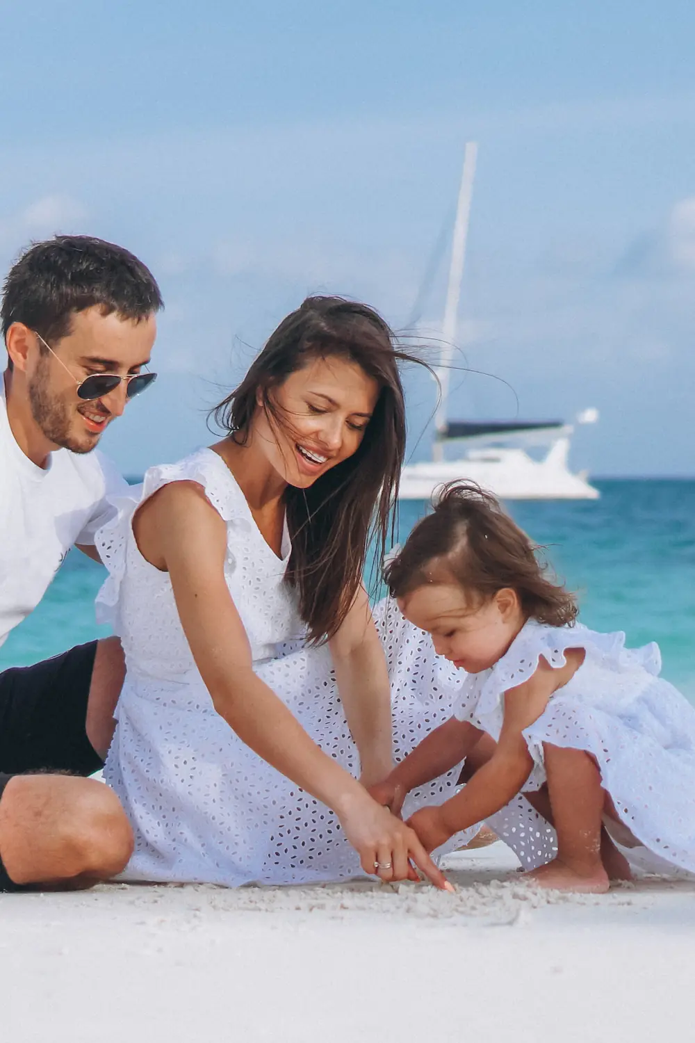 Premium Kerala holiday package featuring a happy family relaxing on a scenic Kerala beach during a luxury coastal vacation