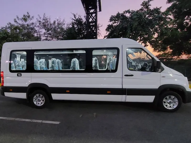 Kerala group tour 17 seater Urbania vehicle exterior view